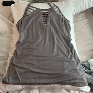 Buckle strapped slinky top. NWT. Sz medium.